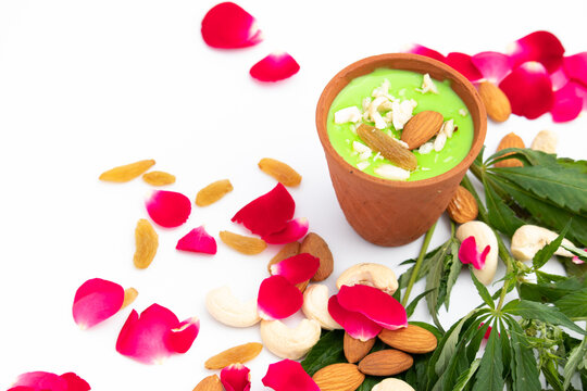 Special Indian Beverage Called Shahi Bhaang Thandai is Cannabis Infused Cooling Drink Made Of Bhang, Milk, Soaked In Dry Fruits Like Almonds Badam Pista Aniseed Rose Petals