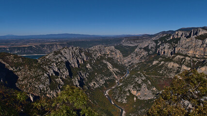 Fototapeta na wymiar Stunning panoramic view over the western part of majestic canyon Verdon Gorge (Gorges du Verdon) in Provence region, southern France on sunny day.