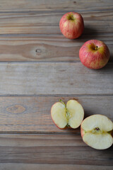fresh apples on wooden background