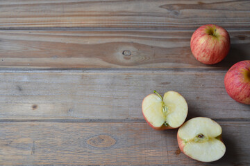 fresh apples on wooden background