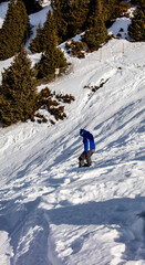 Fototapeta na wymiar snowboarder jumping in the mountains
