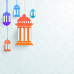 Hanging Colorful Arabic Lanterns Decorated On Pastel Blue Floral Design Background For Muslim Community Festival Concept.