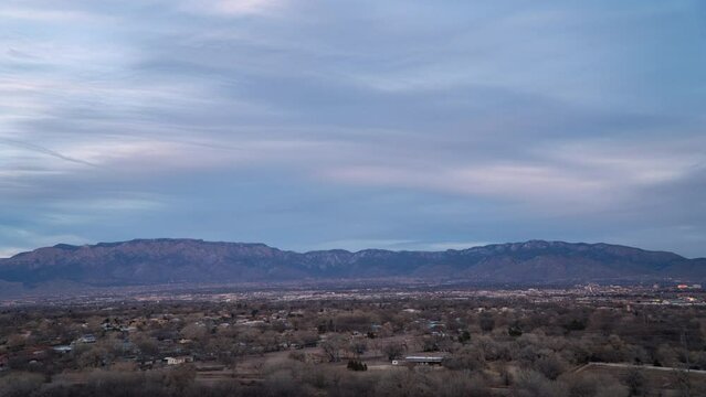 Timelapse of Sandia mountains over Albuquerque New Mexico at sunset, 4K