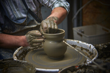Potters hands. The handmade natural concept