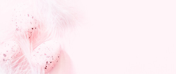 Blurred Easter pink rose minimal composition with Rose eggs and White feathers © Slava