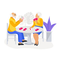 Elderly people are sitting at the table. Pensioners play cards.