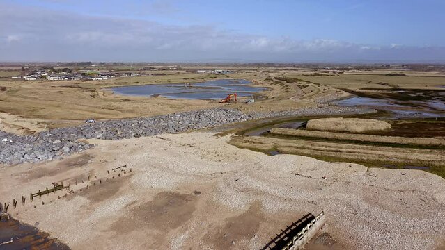 Aerial video of Medberry nature reserve and beach, a haven for birds on the South Coast of England in Bracklesham Bay.