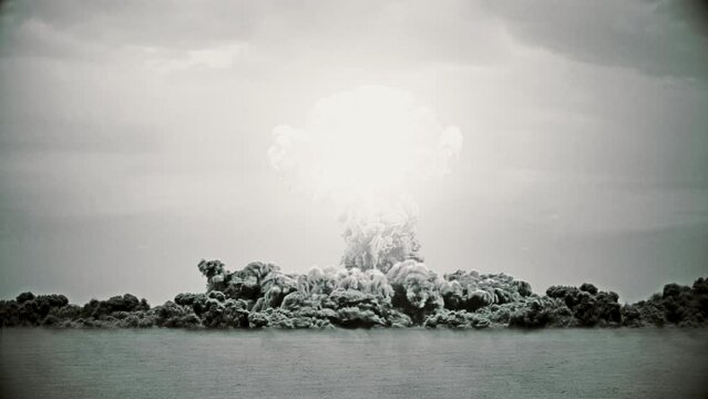 Black and white film look nuclear bomb test with a shockwave hitting camera