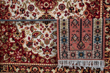 Colorful new modern disign carpet and traditional chiprovtsi carpet close in Bulgaria, Europe