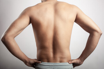 man showing his torso from behind