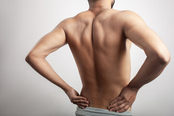 shirtless male body pain on shoulder blade or scapula joint