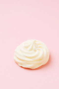 Sweet zefir on pink surface