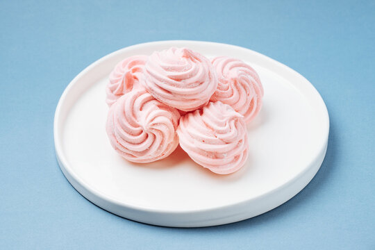Plate with heap of zefir