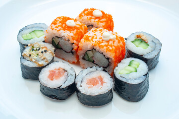 Rolls with flying fish caviar. Japanese food. Sushi menu.