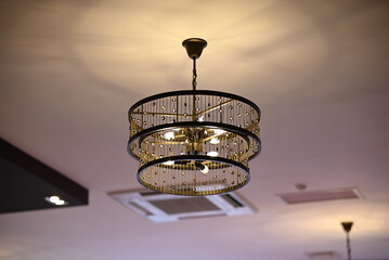 dim chandelier on the ceiling