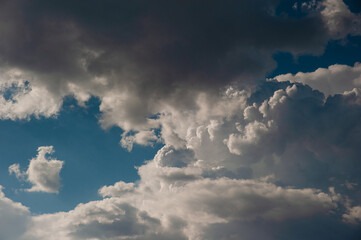 Dramatic cumulus clouds against the blue sky. Peace. No war.