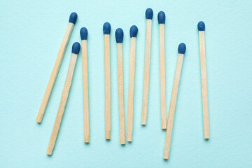 New matchsticks on blue background
