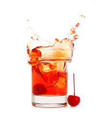 Glass of tasty Manhattan cocktail with splashes isolated on white background