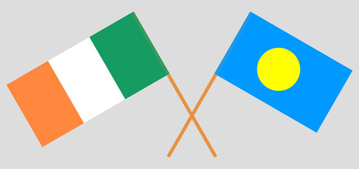 Crossed flags of Ireland and Palau. Official colors. Correct proportion