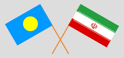 Crossed flags of Palau and Iran. Official colors. Correct proportion