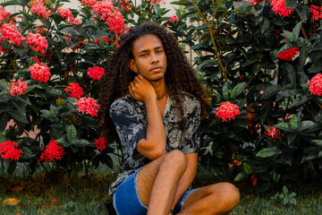 Portrait of a man with long curly hair