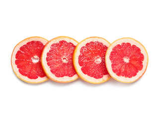 Slices of tasty ripe grapefruit on white background