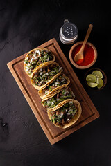 Tacos de Suadero. Fried meat in a corn tortilla. Street food from CDMX, Mexico, traditionally...