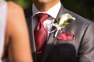 bride and groom with bouquet buttonhole flowers - obrazy, fototapety, plakaty