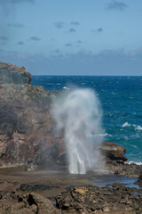 Blowhole in rocks at beach in Maui