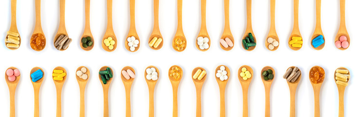 Supplements and vitamins on a white background. Selective focus.