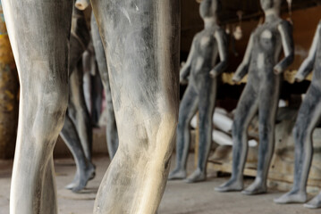 Fototapeta na wymiar Plastic Mannequin legs waiting to be assembled