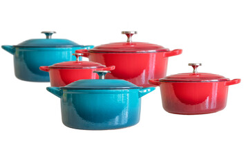 Turquoise and red enameled cast irons covered round dutch ovens isolated on white background