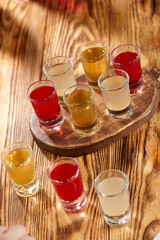 berry shots on the wooden background