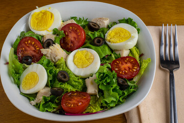delicious salad with eggs  and chicken,