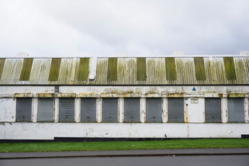 Office window shutters closed due to business closure