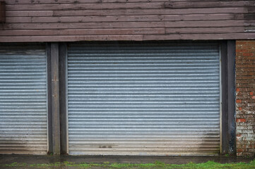 Fototapeta na wymiar Garage roller shutter closed due to business closure