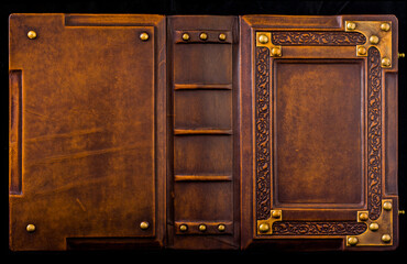 Opened leather book cover, rich decorated with metal corners