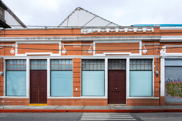 Guatemala – October 10, 2021. Facade of private house in Guatemala City, light at dawn and clear...
