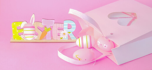 Easter inscription on a pink background. Gift bag and Easter eggs