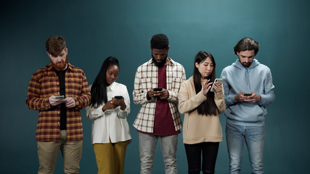 Best friends are standing together and searching through the Internet