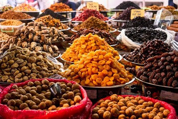 Dried berries on the counter. Raisins, dried apricots, prunes. Vegan food. healthy food. High quality photo
