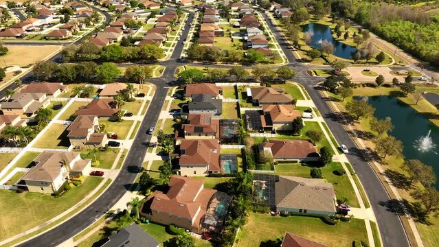 Aerial video homes with backyards and driveways Orlando Witer Garden FL USA