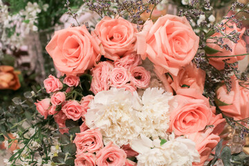 Decoration made of roses, peonies and decorative plants, close-up, selective focus, nobody, objects. Elegant Arrangement Floristics Setting