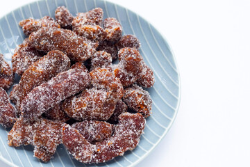 Spicy tamarind mixed with granulated sugar, chili and salt