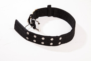 Black dog collar on white background