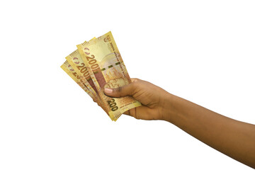 Fair hand holding 3D rendered 200 South African rand notes isolated on white background