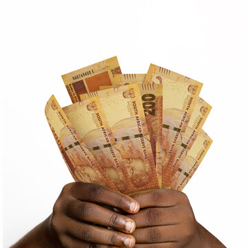 Black hands holding 3D rendered 200 South African Rand. closeup of Hands holding South African currency notes