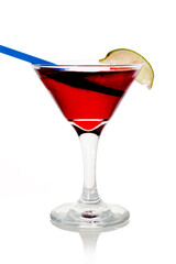 cocktail in a tall glass with cherry and lime