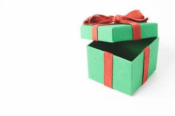 Present. Gift box with a bow. New Year's surprise. Red and green box with a gift