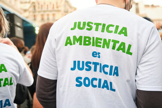 Unknown man with a text on his back: environmental justice is social justice